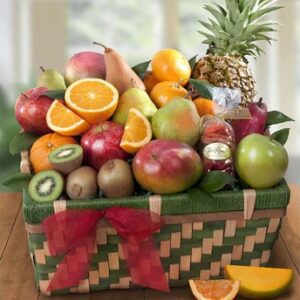 A basket of fruit with an apple, pineapple and orange.