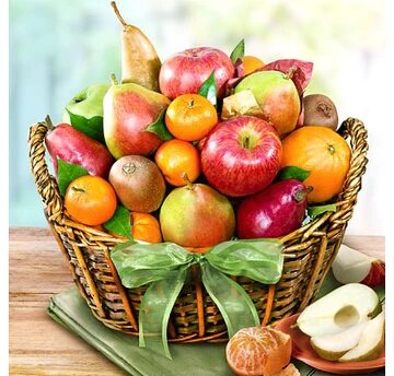 A basket of fruit with apples, oranges and pears.