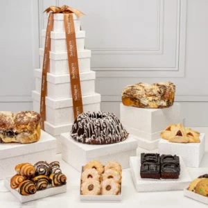 A table topped with lots of different types of donuts.