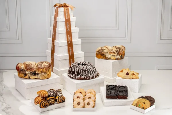 A table topped with lots of different types of donuts.