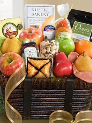 A basket filled with lots of fruit and other food.