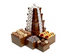 A tower of chocolate covered treats is shown.